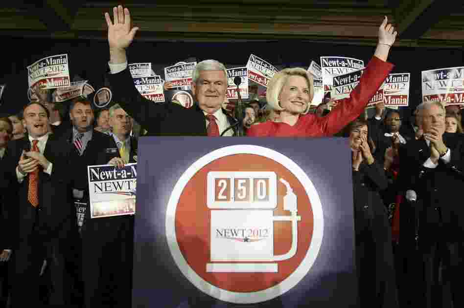 Newt Gingrich and his wife, Callista, wave to supporters at an event in Atlanta after he was declared the winner of the Georgia primary. 