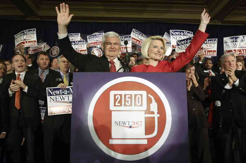 Newt Gingrich and his wife, Callista, wave to supporters at an event in Atlanta after he was declared the winner of the Georgia primary. 