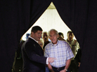 Texas Rep. Ron Paul (right) talks with the his presidential campaign manager, Jesse Benton, backstage at the Republican Party's Iowa straw poll last August. Texas Rep. Ron Paul (right) talks with the his presidential campaign manager, Jesse Benton, backstage at the Republican Party's Iowa straw poll last August.