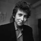 Bob Dylan smiles during a meeting with the British press, April 28, 1965.