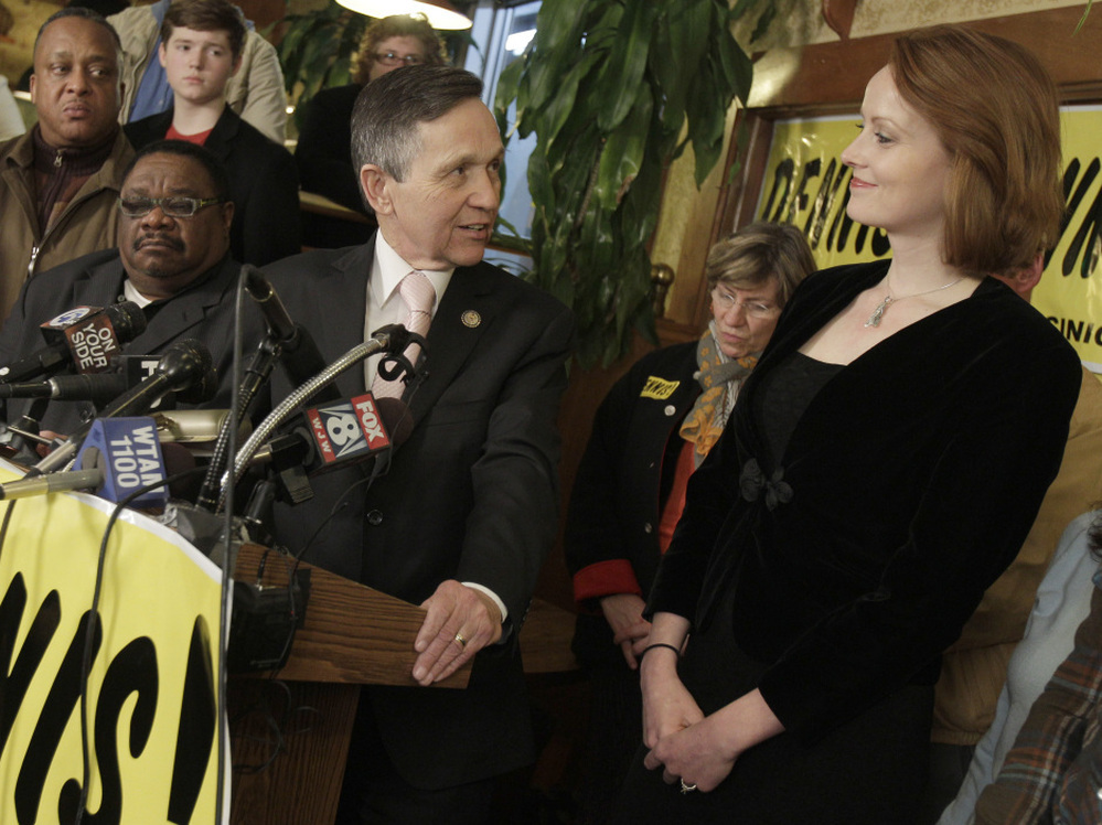Rep. Dennis Kucinich thanks his wife, Elizabeth, during his concession speech, in Cleveland on Tuesday. 