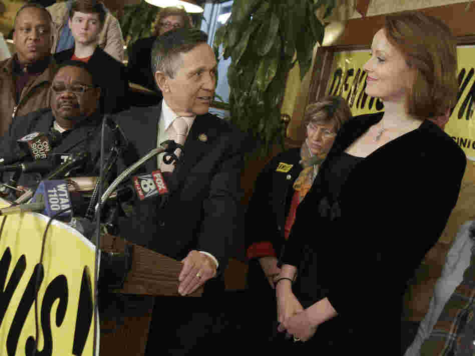 Rep. Dennis Kucinich thanks his wife, Elizabeth, during his concession speech, in Cleveland on Tuesday. 