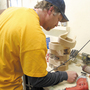 Robby Richardson crafts handmade stirrups for Nettles Country in Madisonville, Texas. The company would like to hire more workers, but can't afford to. Robby Richardson crafts handmade stirrups for Nettles Country in Madisonville, Texas. The company would like to hire more workers, but can't afford to.