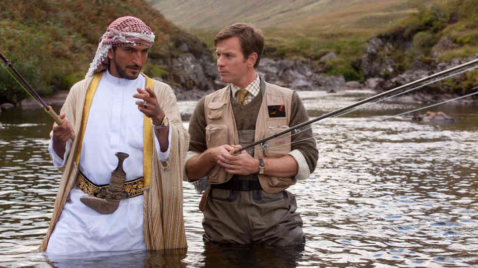 All Wet? Sheikh Muhammed (Amr Waked) tries to assure skeptical Scottish fisheries expert Dr. Alfred Jones (Ewan McGregor) that his plan to bring salmon fishing to Yemen is viable. All Wet? Sheikh Muhammed (Amr Waked) tries to assure skeptical Scottish fisheries expert Dr. Alfred Jones (Ewan McGregor) that his plan to bring salmon fishing to Yemen is viable.