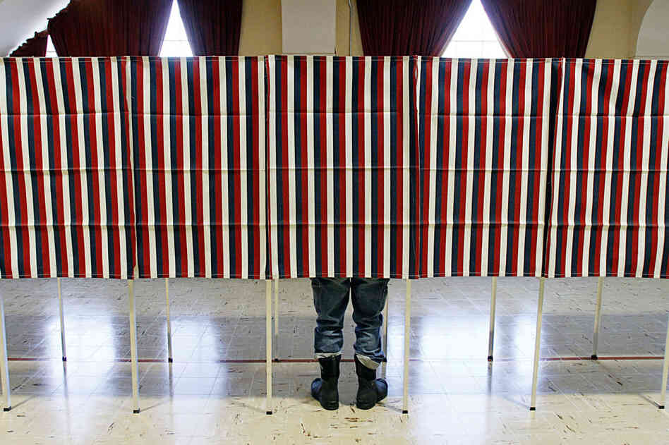A voter casts his ballot in Montpelier, Vt. Romney is also expected to do well in the state, which borders Massachusetts. 