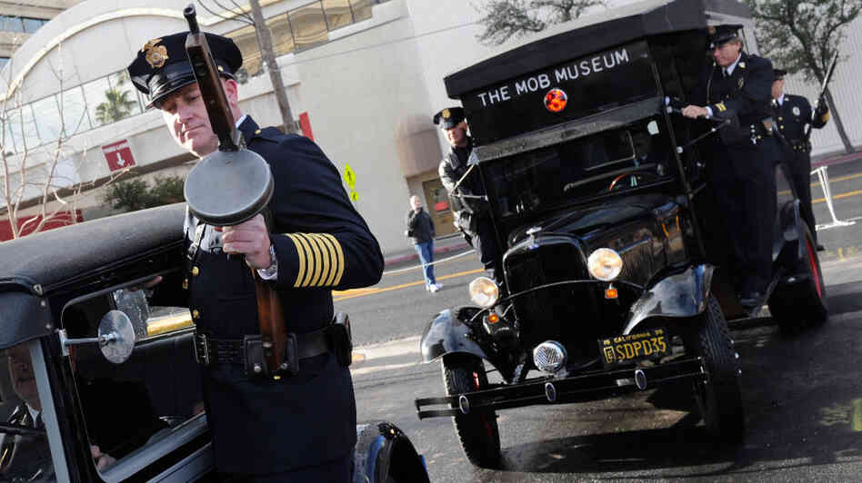 Look Out, Copper: A 1928 Ford Model A car (left) and a 1938 Ford paddy wagon arrive at the Feb. 14 grand opening of The Mob Museum in Las Vegas. Look Out, Copper: A 1928 Ford Model A car (left) and a 1938 Ford paddy wagon arrive at the Feb. 14 grand opening of The Mob Museum in Las Vegas.