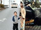 Yuko Sugimoto (right) stands reunited with her 5-year-old son, Raito, on a road in Japan's Miyagi prefecture, 2012. This photo was taken at the same place where she was photographed immediately after the tsunami in March 2011. Yuko Sugimoto (right) stands reunited with her 5-year-old son, Raito, on a road in Japan's Miyagi prefecture, 2012. This photo was taken at the same place where she was photographed immediately after the tsunami in March 2011.