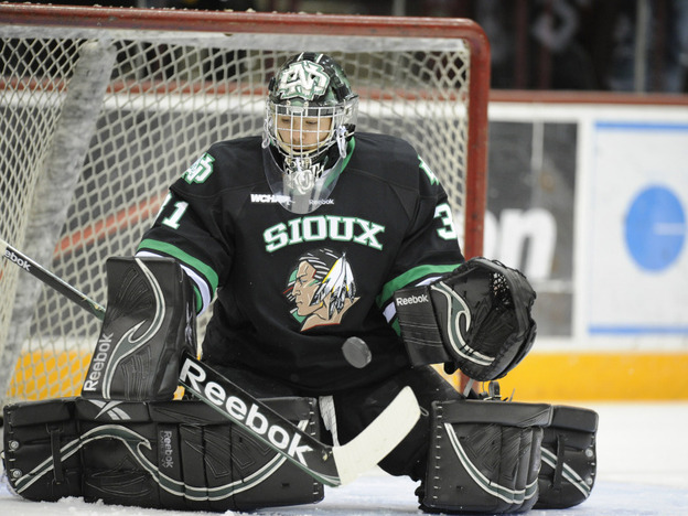 The University of North Dakota's Brad Eidsness makes a save during a game against the Minnesota Golden Gophers. Since 2005, there have been a series of lawsuits and legislative actions over the nickname for the school's athletic teams, the "Fighting Sioux."