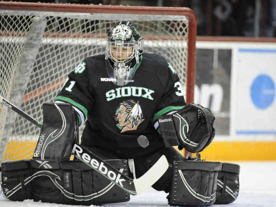 The University of North Dakota's Brad Eidsness makes a save during a game against the Minnesota Golden Gophers. Since 2005, there have been a series of lawsuits and legislative actions over the nickname for the school's athletic teams, the "Fighting Sioux."