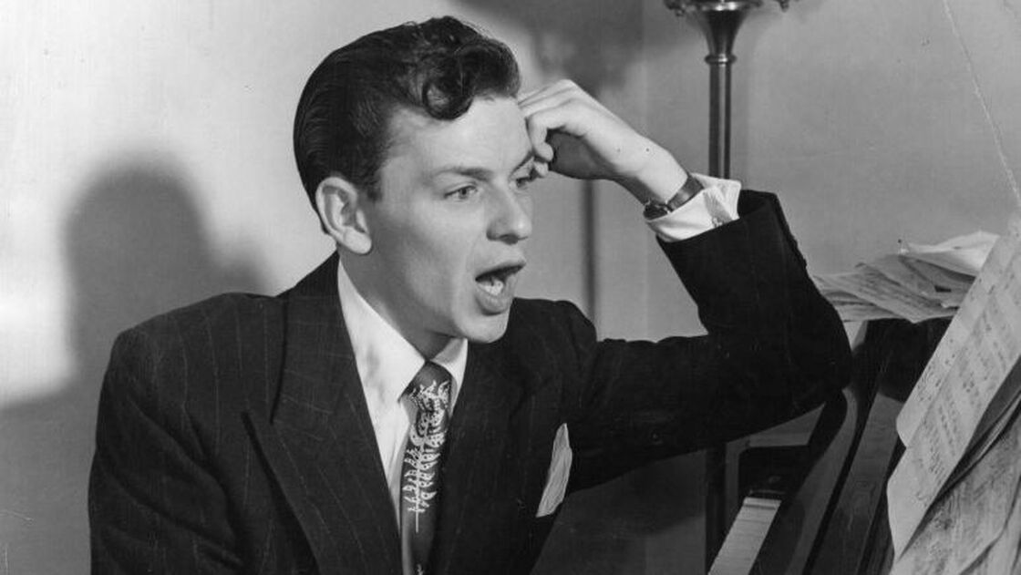 Frank Sinatra at the piano.