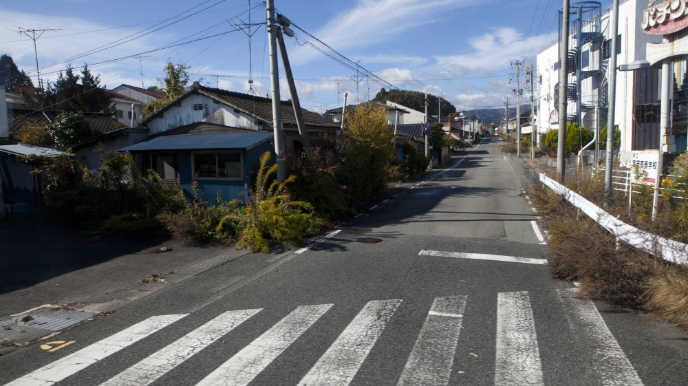 A deserted street inside the contaminated exclusion zone around the crippled Fukushima Dai-ichi nuclear power station, on Nov. 12, 2011. Experts say health effects of radiation exposure likely won't be detectable and a bigger problem is the mental health issues resulting from the trauma of the tsunami.