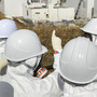 Members of the media, wearing protective suits and masks, visit the tsunami-crippled Fukushima nuclear power station during a press tour, in northeastern Japan's Fukushima prefecture, Feb. 28. Japan is marking the first anniversary of the March 11 tsunami and earthquake, which triggered the worst nuclear accident in the country's history.