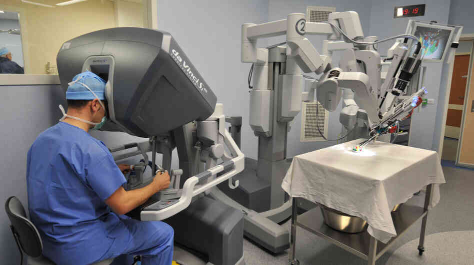 Surgical robots like this one are wildly expensive. Before the economic troubles began, investment in such high-tech medical devices was plentiful. Now, hospitals are looking for comparatively simple solutions to cut costs: streamline medical billing and even investing in $1 catheters that can save upwards of $50,000. Surgical robots like this one are wildly expensive. Before the economic troubles began, investment in such high-tech medical devices was plentiful. Now, hospitals are looking for comparatively simple solutions to cut costs: streamline medical billing and even investing in $1 catheters that can save upwards of $50,000.