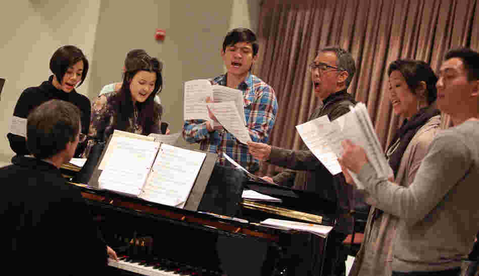 Prepping for a New York City Shinsai benefit, actors Angel Desai (left), Olivia Oguma, Paolo Montalban, Thom Sesma, Cindy Cheung and Johnny Wu rehearse songs from Pacific Overtures in a Lincoln Center studio. 