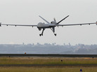 A Predator B unmanned aircraft lands after a mission at the Naval Air Station last November in Corpus Christi, Texas. A Predator B unmanned aircraft lands after a mission at the Naval Air Station last November in Corpus Christi, Texas.