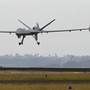 A Predator B unmanned aircraft lands after a mission at the Naval Air Station last November in Corpus Christi, Texas. A Predator B unmanned aircraft lands after a mission at the Naval Air Station last November in Corpus Christi, Texas.