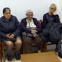 Patients sit in the waiting room of a free medical clinic in Perama, Greece, run by an international aid group, Doctors of the World, last month. Official unemployment in the port town is 80 percent, and many people are unable to afford food and medicine.