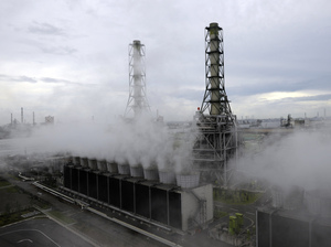 Steam rises from the Kawasaki natural gas power station in Kawasaki city, Kanagawa prefecture, on Aug. 25, 2011. Major utility companies in Japan have increased their use of liquefied natural gas by about 27 percent since the earthquake and nuclear disaster.