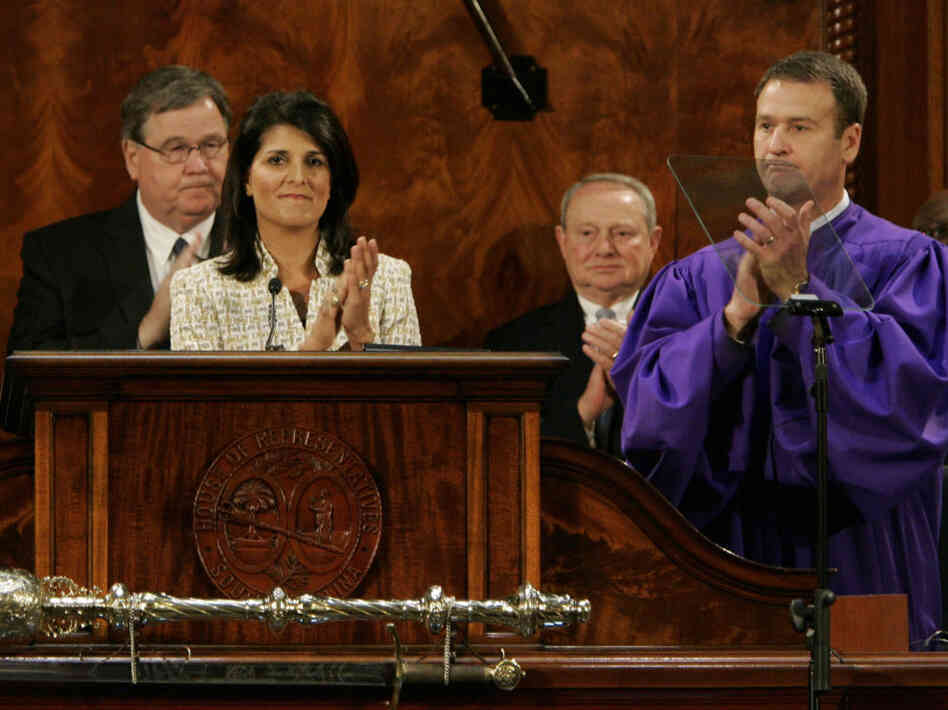 Ken Ard, right, who was South Carolina's lieutenant governor until Friday, shall no longer don the purple robe of his office. Here he was with Gov. Nikki Haley at her state of the state speech in January 2012.
