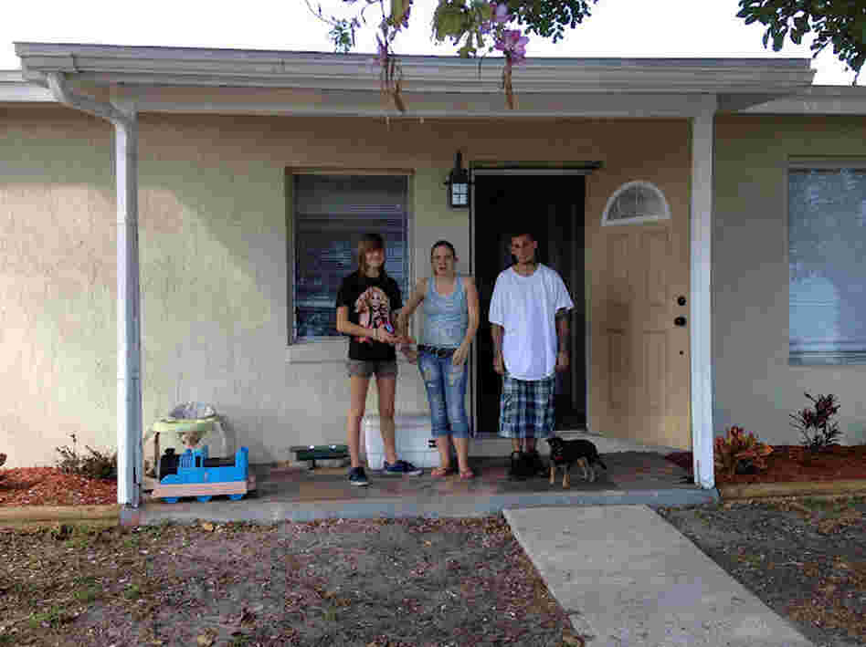 Willow and her tenants, in front of the house Willow bought with her mother. Willow and her tenants, in front of the house Willow bought with her mother.