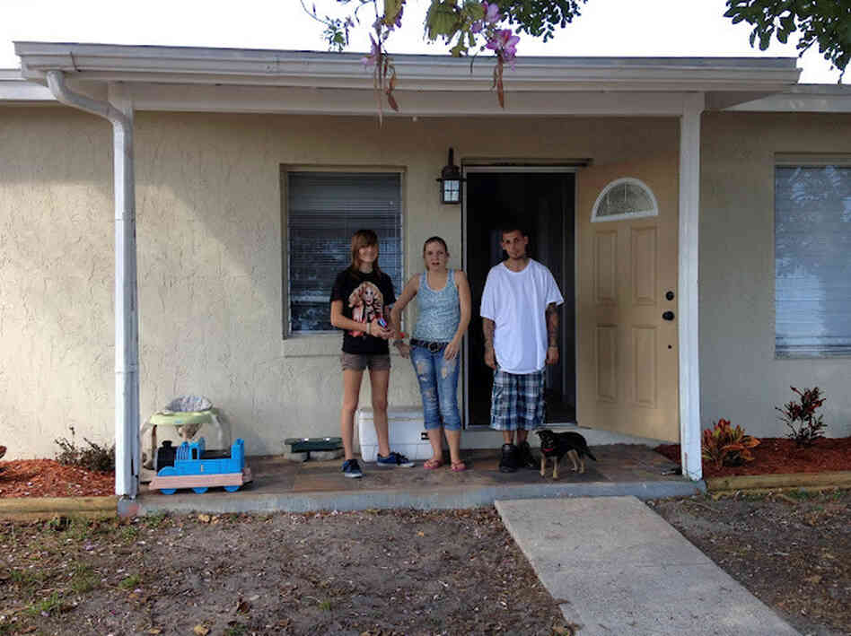 Willow and her tenants, in front of the house Willow bought with her mother. Willow and her tenants, in front of the house Willow bought with her mother.