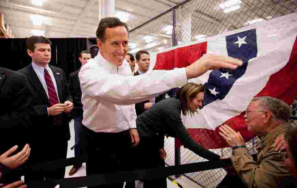 Former Pennsylvania Sen. Rick Santorum and his wife, Karen, greet supporters during a rally Saturday in Springfield, Mo. After picking up a decisive win in Kansas, Santorum now turns his attention to Missouri's upcoming caucuses.