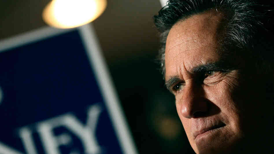 Mitt Romney waits to speak while being introduced Monday during a campaign stop in Mobile, Ala.