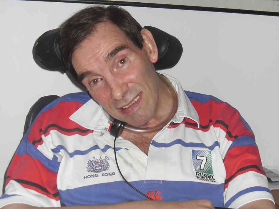 In this family photo released in Jan. 2012 by Tony and Jane Nicklinson, former corporate manager, rugby player, skydiving sports enthusiast Tony Nicklinson sits at his home in Wiltshire, England.