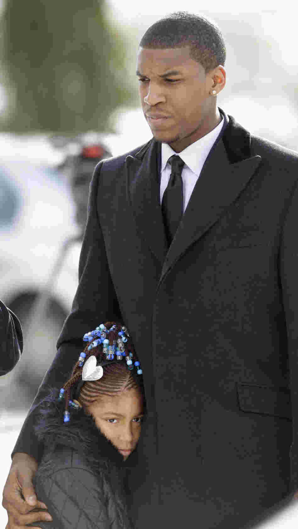 Kansas basketball player Thomas Robinson and his 9-year-old sister, Jayla, arrive for the funeral of their mother, Lisa, on Jan. 27, 2011, at Antioch Baptist Church in Washington, D.C. Robinson's mother and grandparents died within a few weeks of each other. Kansas basketball player Thomas Robinson and his 9-year-old sister, Jayla, arrive for the funeral of their mother, Lisa, on Jan. 27, 2011, at Antioch Baptist Church in Washington, D.C. Robinson's mother and grandparents died within a few weeks of each other.