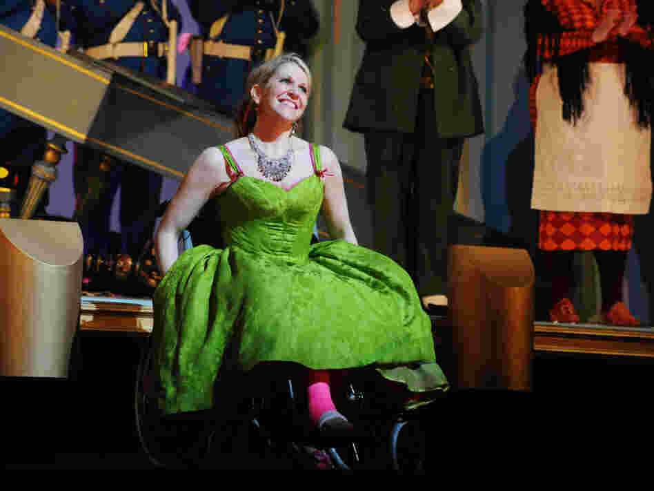 Joyce DiDonato performs in her wheelchair and pink cast after breaking her leg in a production of  Rossini's Barber of Seville, at London's Royal Opera House.