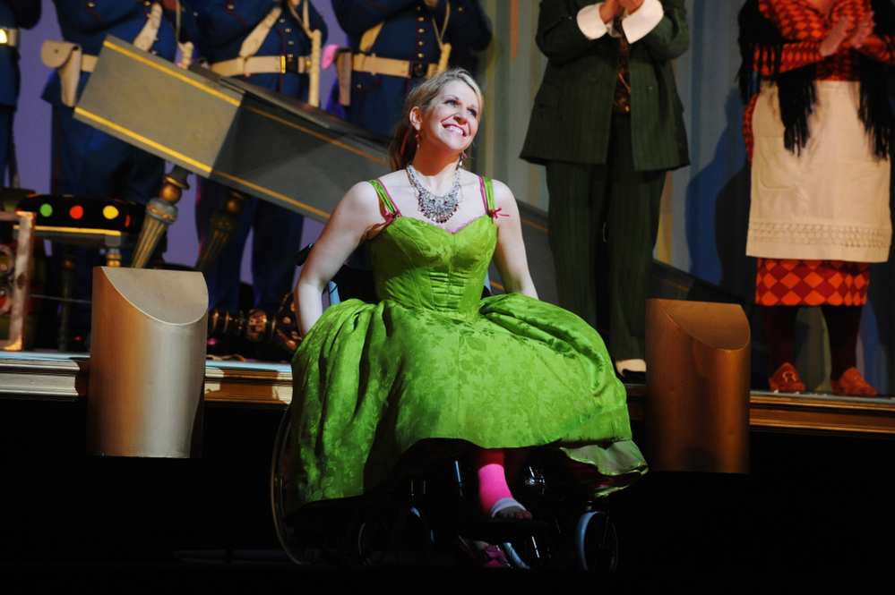 Joyce DiDonato performs in her wheelchair and pink cast after breaking her leg in a production of  Rossini's Barber of Seville, at London's Royal Opera House.