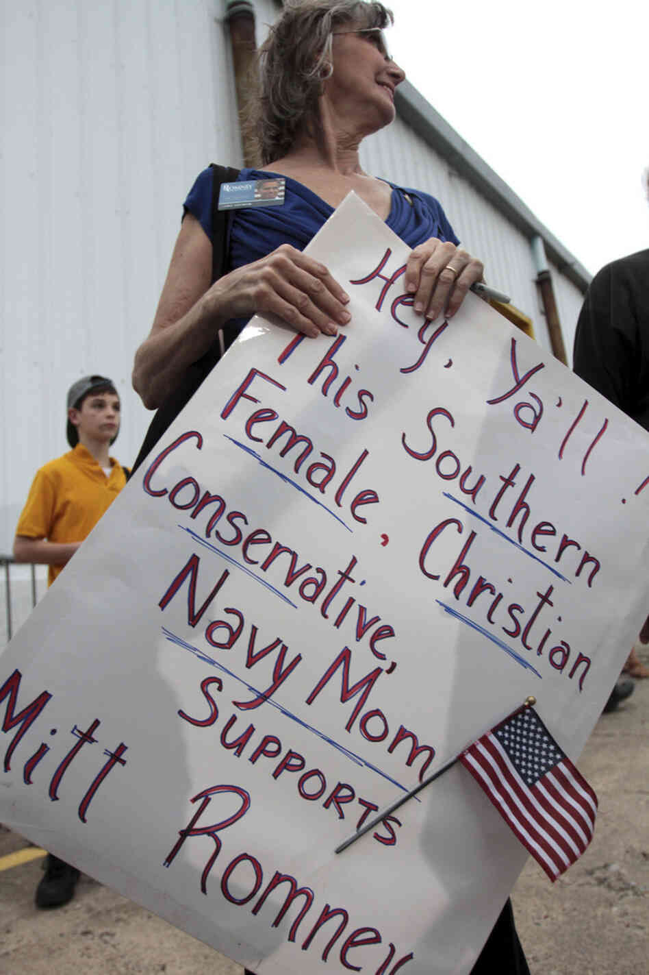 Carla Castorina of Hurley, Miss., holds a sign supporting former Massachusetts Gov. Mitt Romney after a campaign rally at the Port of Pascagoula in Pascagoula, Miss., on March 8. Polls show a tight race in the state, which holds its primary on Tuesday. Carla Castorina of Hurley, Miss., holds a sign supporting former Massachusetts Gov. Mitt Romney after a campaign rally at the Port of Pascagoula in Pascagoula, Miss., on March 8. Polls show a tight race in the state, which holds its primary on Tuesday.