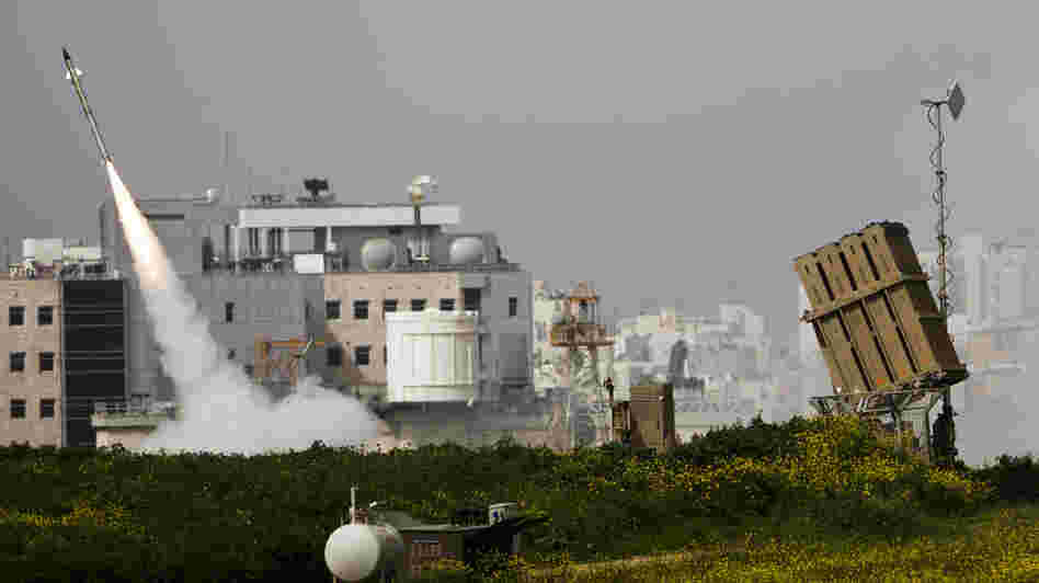 The Israeli military says its Iron Dome system has been extremely effective against Palestinian rockets coming out of the Gaza Strip. Here, an Israeli missile is launched Monday near the city of Ashdod in response to a Palestinian rocket.