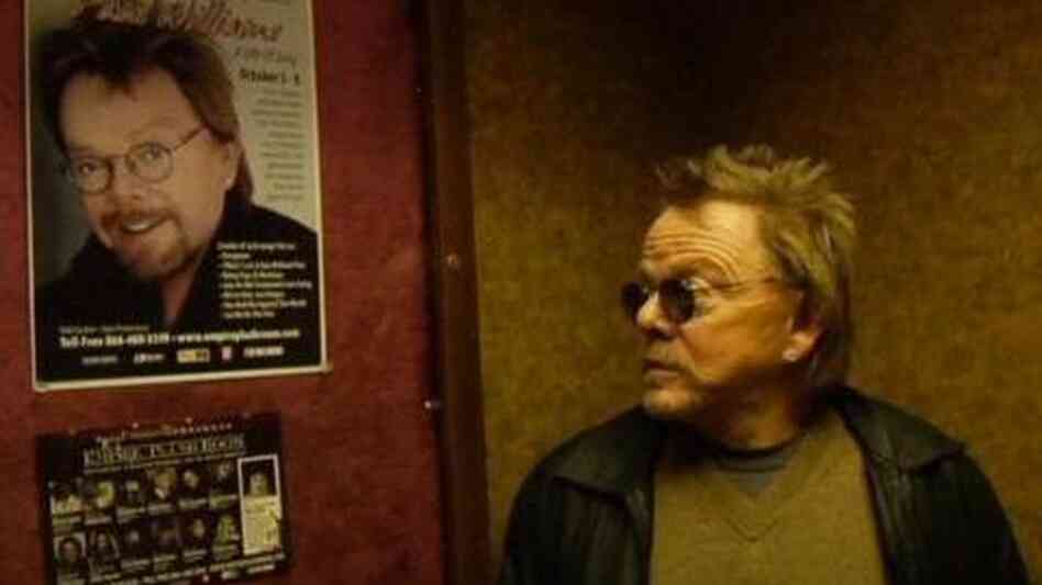Paul Williams stares at a poster advertising an upcoming performance in the documentary Paul Williams Still Alive. Paul Williams stares at a poster advertising an upcoming performance in the documentary Paul Williams Still Alive.