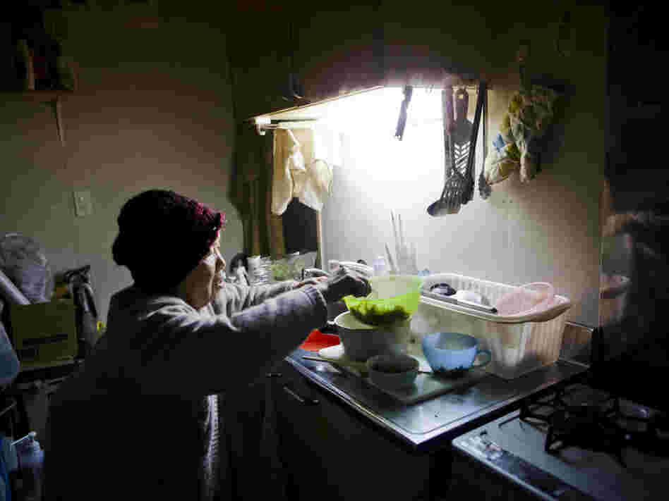 Last year's tsunami destroyed Tamiko Abe's house, and a year later, the 71-year-old (shown here March 5, 2012) still lives in temporary housing. 