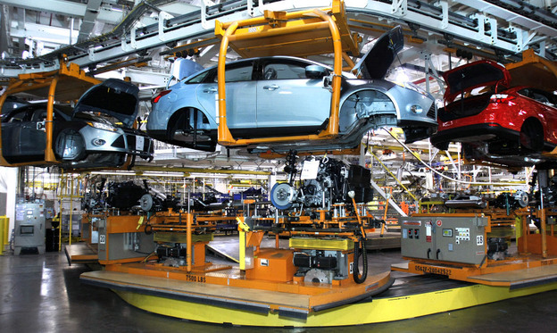 Workers build cars on the assembly line at the Ford Motor Co.'s Michigan Assembly Plant in Wayne, Mich., in December. As auto sales boom, parts suppliers are having a tough time finding the labor they need to catch up, having lost workers during the recession. Workers build cars on the assembly line at the Ford Motor Co.'s Michigan Assembly Plant in Wayne, Mich., in December. As auto sales boom, parts suppliers are having a tough time finding the labor they need to catch up, having lost workers during the recession.