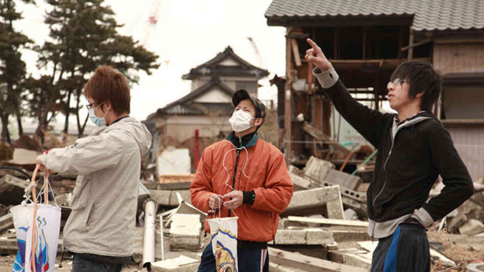 High-school student Kento Ito (right) and friends prepare for a Children's Day ceremony honoring Kento's little brother, Ritsu-kun, and others who perished in the Tohoku earthquake and tsunami of March 2011. High-school student Kento Ito (right) and friends prepare for a Children's Day ceremony honoring Kento's little brother, Ritsu-kun, and others who perished in the Tohoku earthquake and tsunami of March 2011.