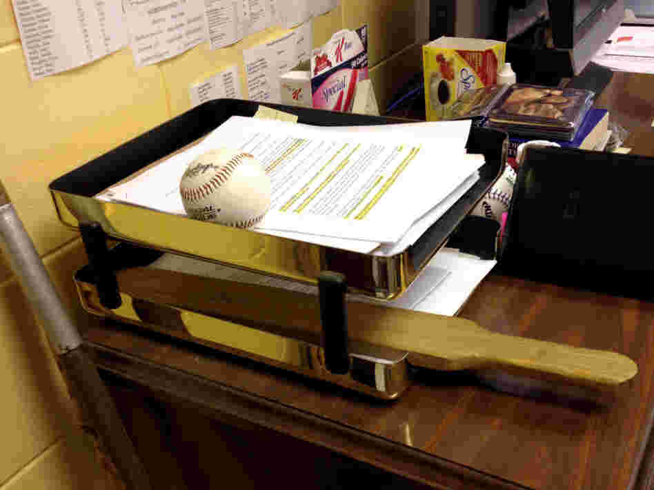 A wooden paddle sits on the principal's desk at Sneads High School in Jackson County, Fla. Almost every county in the state's rural north has policies that allow schools to paddle students.