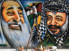 Palestinian artist Mohammed al-Dairi paints a mural of late Palestinian leader Yasser Arafat (right) and late Hamas leader Sheikh Ahmed Yassin (left), in Gaza City. Hamas leaders are divided on what direction to take the Islamist movement, with some calling for reconciliation with Arafat's Fatah movement. Palestinian artist Mohammed al-Dairi paints a mural of late Palestinian leader Yasser Arafat (right) and late Hamas leader Sheikh Ahmed Yassin (left), in Gaza City. Hamas leaders are divided on what direction to take the Islamist movement, with some calling for reconciliation with Arafat's Fatah movement.