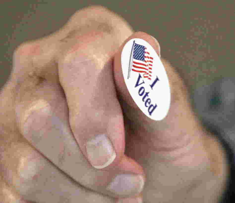 In Madison, Miss., earlier today, precinct worker Bob Shirley was handing out "I Voted" stickers. 