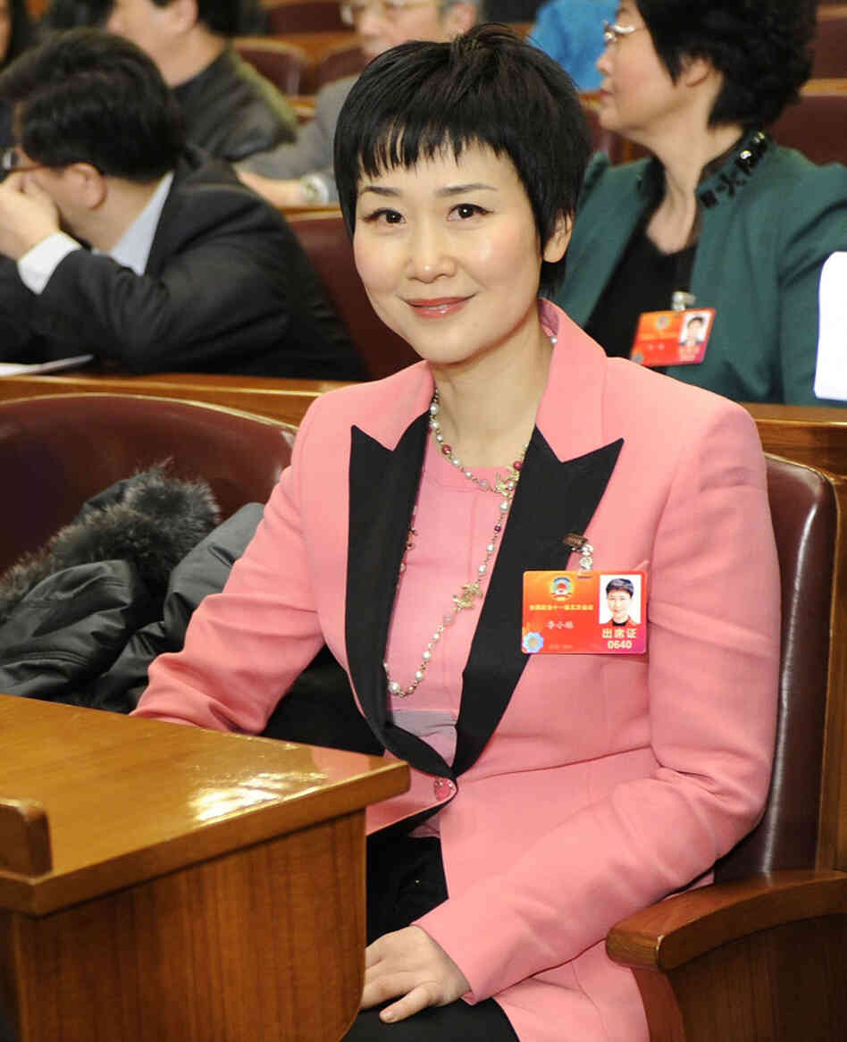 Li Xiaolin, daughter of former Chinese Premier Li Peng, attends the opening ceremony of the CPPCC in Beijing, March 3, 2012. Her suit — by Italian designer Emilio Pucci — is estimated to cost $2,000. Li Xiaolin, daughter of former Chinese Premier Li Peng, attends the opening ceremony of the CPPCC in Beijing, March 3, 2012. Her suit — by Italian designer Emilio Pucci — is estimated to cost $2,000.