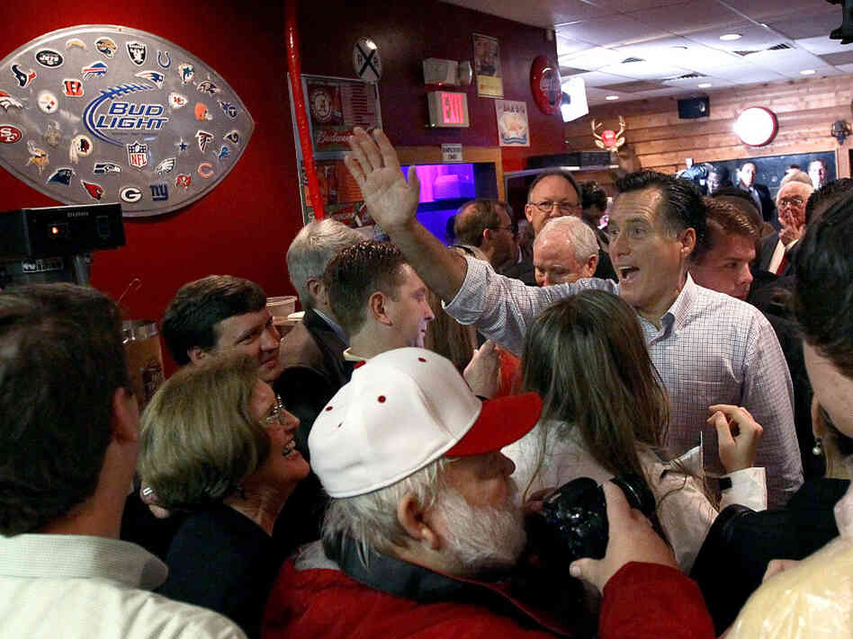 Can Mitt Romney finally win a Southern state Tuesday? Here, Romney greets Alabamans at the Whistle Stop Cafe in Mobile on Monday.