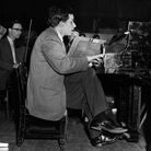 A 1959 picture of Glenn Gould rehearsing at London's Royal Festival Hall. (Yes, he's seated on an abnormally short piano stool, hovering only a few inches above the floor.) A 1959 picture of Glenn Gould rehearsing at London's Royal Festival Hall. (Yes, he's seated on an abnormally short piano stool, hovering only a few inches above the floor.)