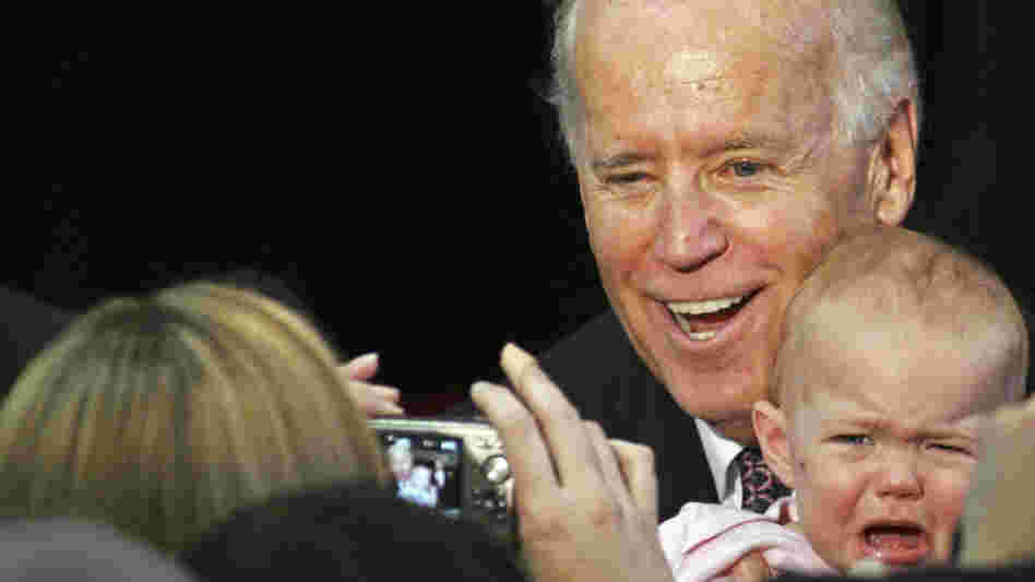 Vice President Joe Biden poses with an uncooperative baby at a speech in Tallahassee, Fla., on Feb. 6. On Thursday, he's in Ohio to begin a series of speeches aimed at framing the presidential race.