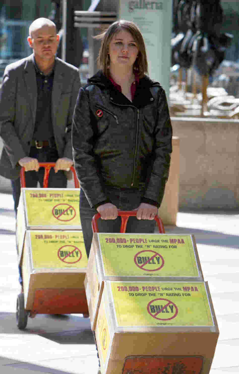 Michigan high school student Katy Butler, 17, and Change.org organizer Mark Anthony Dingbaum deliver petitions with more than 200,000 signatures to the Motion Picture Association of America in Los Angeles on March 7, asking the group to change the R rating on the documentary Bully. 