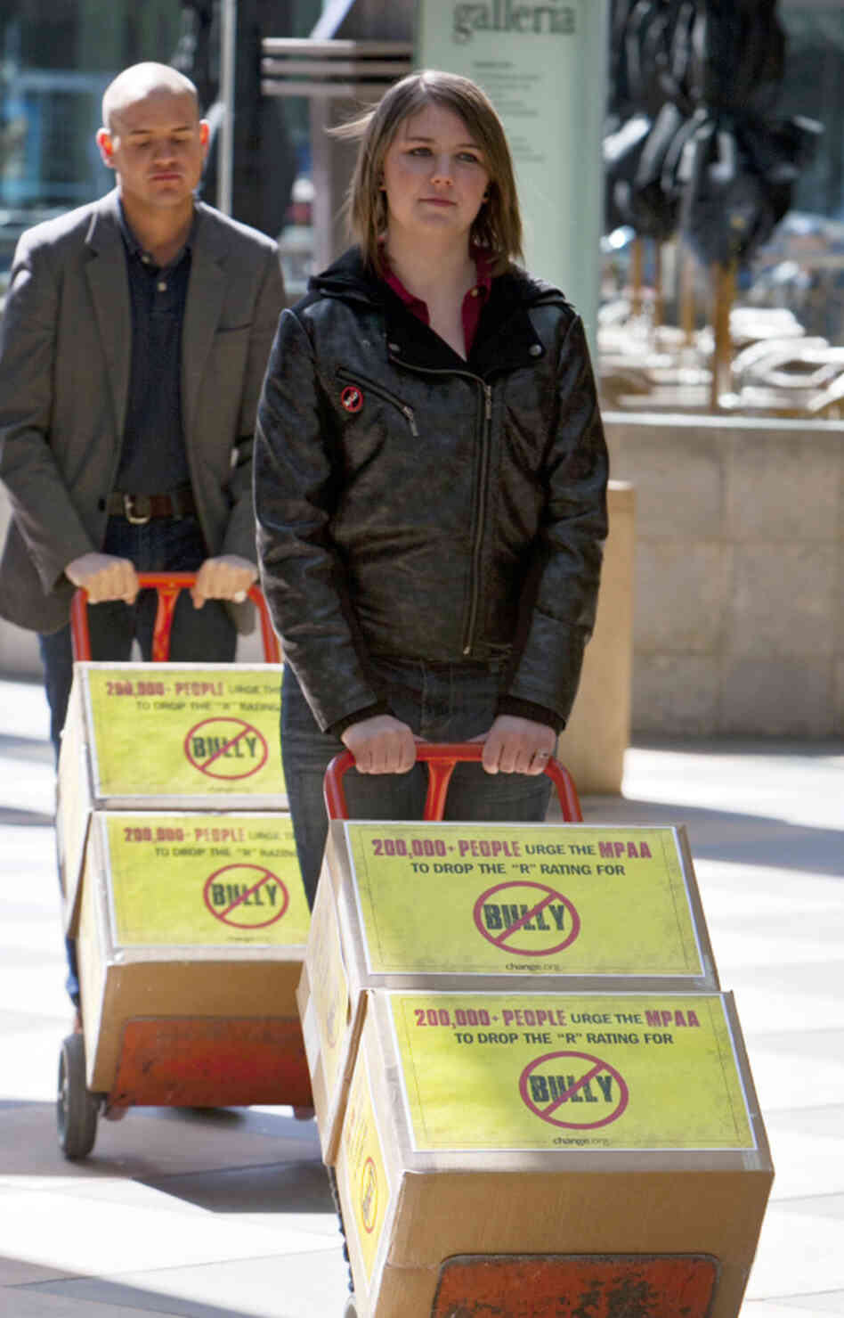 Michigan high school student Katy Butler, 17, and Change.org organizer Mark Anthony Dingbaum deliver petitions with more than 200,000 signatures to the Motion Picture Association of America in Los Angeles on March 7, asking the group to change the R rating on the documentary Bully. 