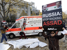 Campaigners from the international advocacy group Avaaz protest Russian arms sales to the Syrian government during a demonstration in front of the Russian Embassy in Berlin on Nov. 2. Campaigners from the international advocacy group Avaaz protest Russian arms sales to the Syrian government during a demonstration in front of the Russian Embassy in Berlin on Nov. 2.