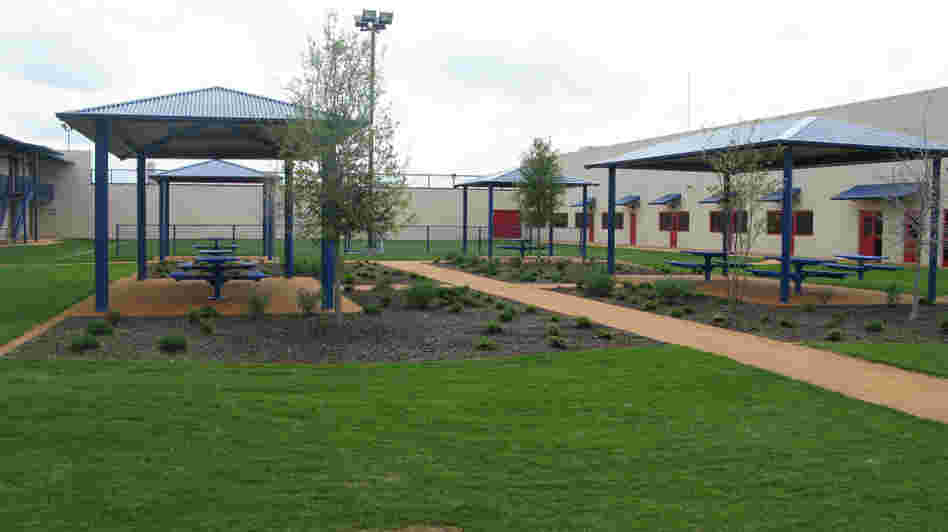 The Karnes County Civil Detention Center in Texas has outdoor spaces and other features meant to make immigrant detention less like prison. It will house mostly low-risk, nonviolent offenders. The Karnes County Civil Detention Center in Texas has outdoor spaces and other features meant to make immigrant detention less like prison. It will house mostly low-risk, nonviolent offenders.