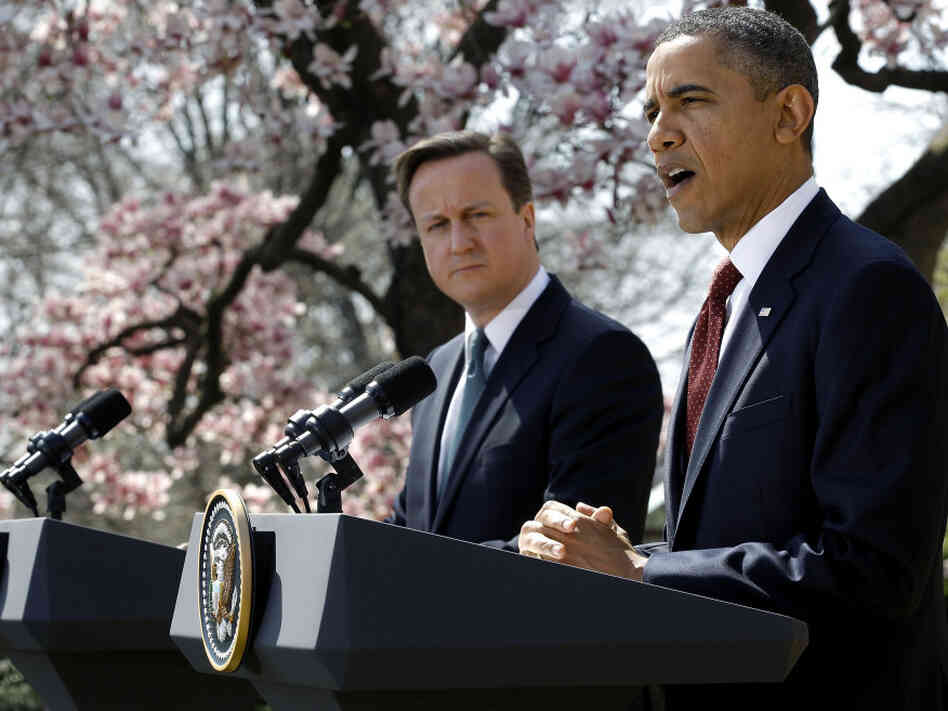 President Obama and British Prime Minister David Cameron during their news conference this afternoon in the Rose Garden of the White House.