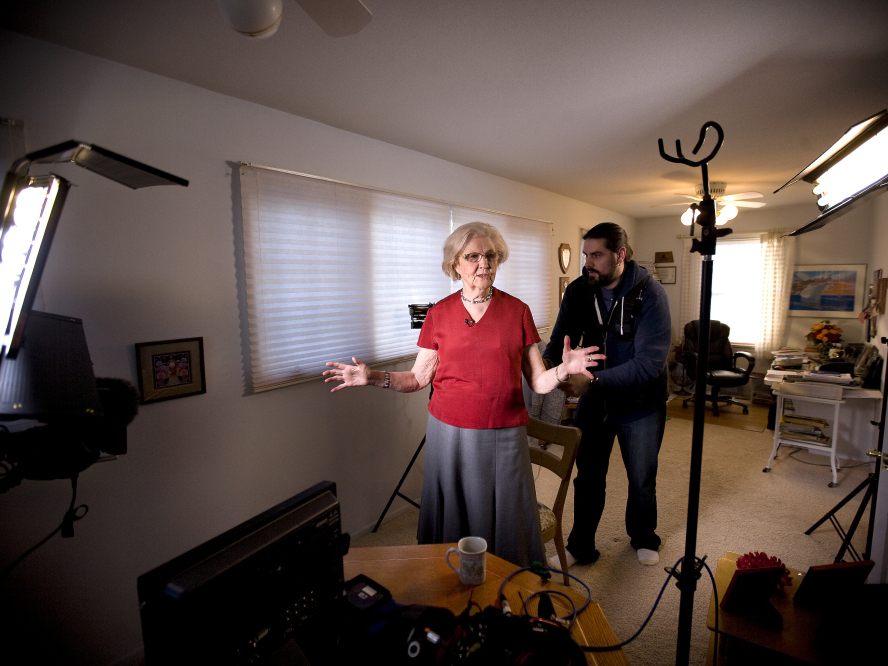 Columnist Marilyn Hagerty's den is converted into a makeshift television studio as a crew from CNN prepares her for an interview.